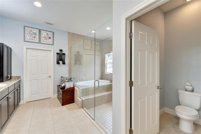 19300 Lonesome Pine Dr, Land O Lakes, FL 34638 - bathroom with toilet, tile patterned flooring, a shower stall, and visible vents