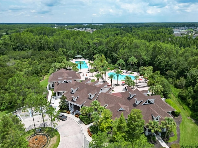 19300 Lonesome Pine Dr, Land O Lakes, FL 34638 - aerial view with a forest view