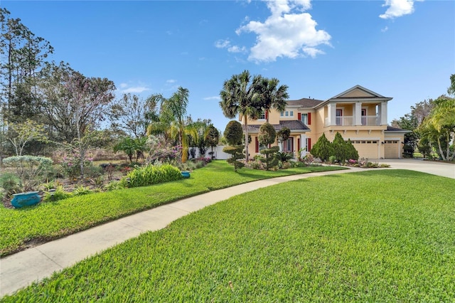 19300 Lonesome Pine Dr, Land O Lakes, FL 34638 - view of front of property with concrete driveway, a balcony, an attached garage, a front yard, and stucco siding