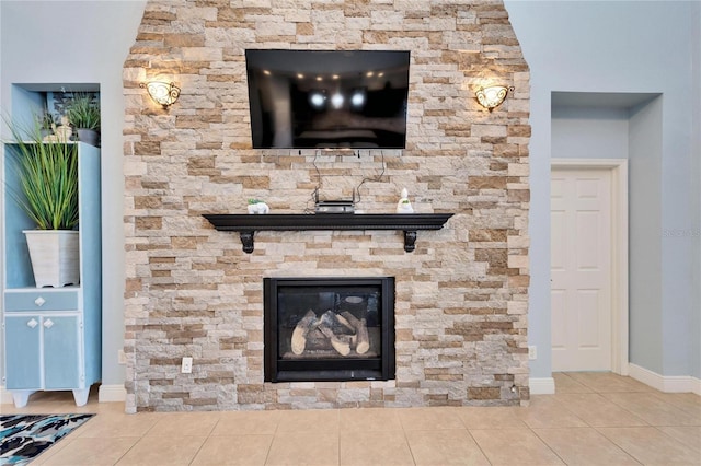 19300 Lonesome Pine Dr, Land O Lakes, FL 34638 - room details with a stone fireplace and baseboards
