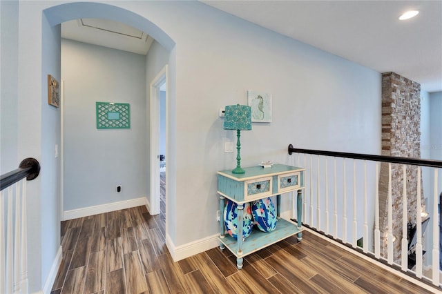19300 Lonesome Pine Dr, Land O Lakes, FL 34638 - hall featuring arched walkways, wood finish floors, recessed lighting, and baseboards