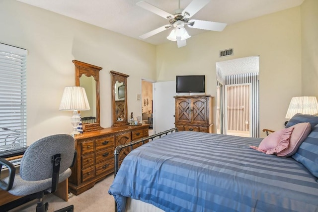 bedroom with light colored carpet and ceiling fan