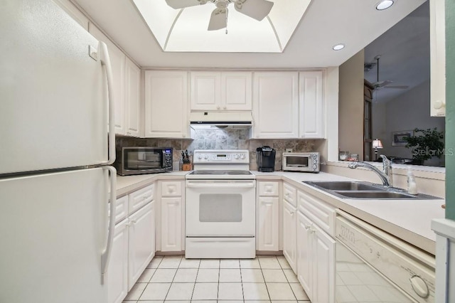 kitchen featuring light tile patterned flooring, white appliances, white cabinets, ceiling fan, and decorative backsplash