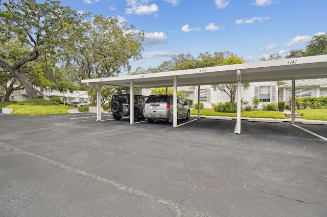 view of parking featuring a carport