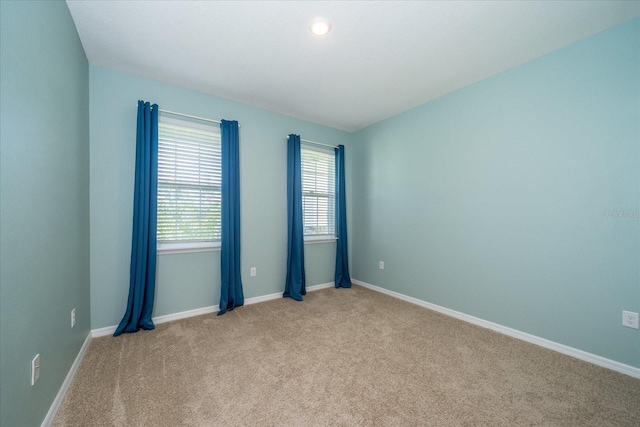 view of carpeted spare room