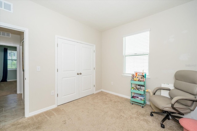 sitting room with light carpet