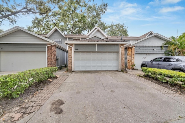 single story home with a garage