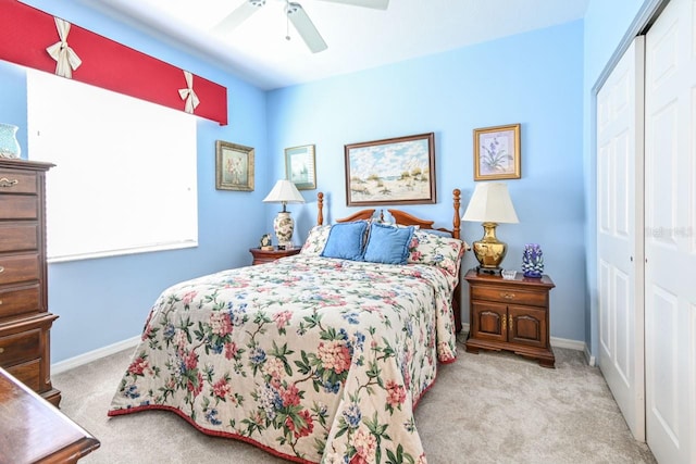 bedroom featuring carpet flooring, a closet, and ceiling fan