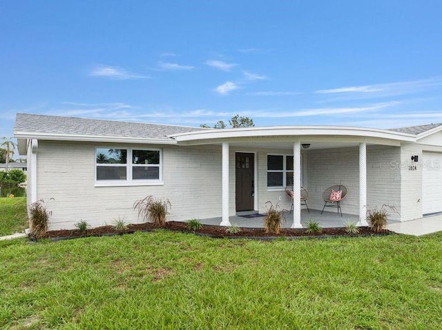 ranch-style house with a front yard