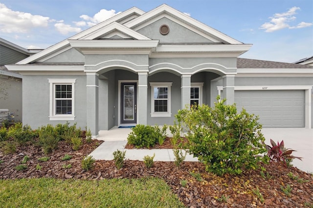 view of front of property with a garage