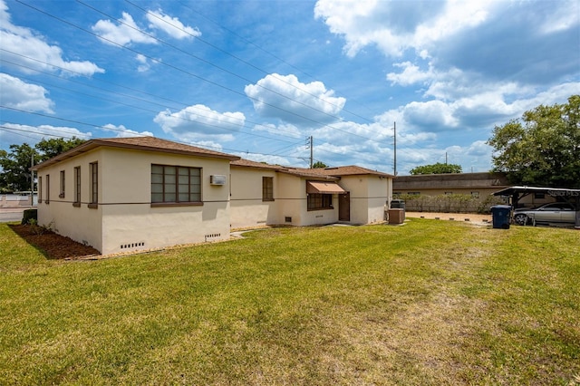 view of front of property featuring a front yard and stucco siding