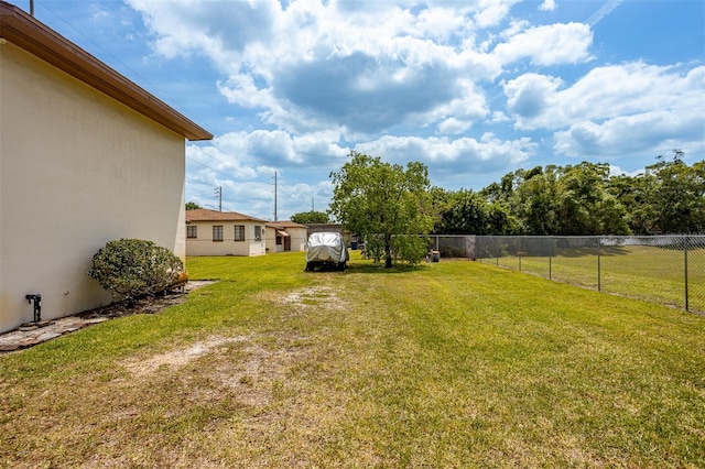 view of yard featuring fence