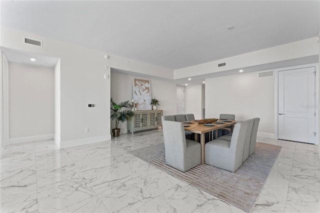 2910 W Barcelona St Unit 903, Tampa, FL 33629 - dining space with visible vents, marble finish floor, and baseboards