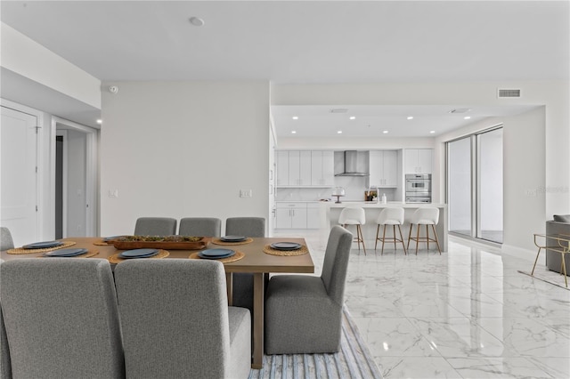 2910 W Barcelona St Unit 903, Tampa, FL 33629 - dining area with visible vents, marble finish floor, and recessed lighting