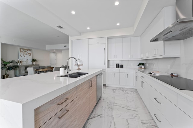 2910 W Barcelona St Unit 903, Tampa, FL 33629 - kitchen featuring modern cabinets, wall chimney range hood, black electric stovetop, and a sink