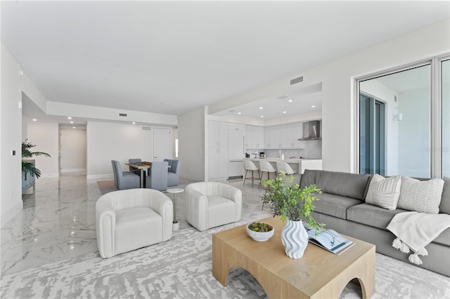 2910 W Barcelona St Unit 903, Tampa, FL 33629 - living area with marble finish floor, baseboards, visible vents, and recessed lighting