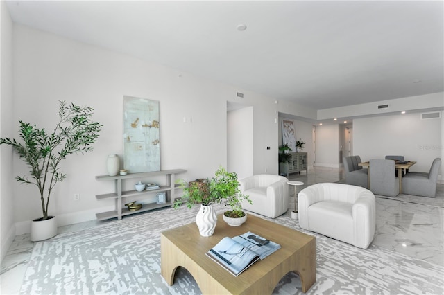 2910 W Barcelona St Unit 903, Tampa, FL 33629 - living area featuring visible vents, baseboards, and marble finish floor