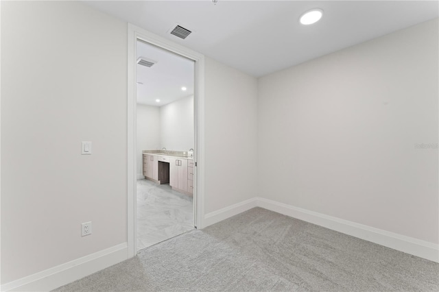 2910 W Barcelona St Unit 903, Tampa, FL 33629 - empty room featuring baseboards, light carpet, visible vents, and recessed lighting