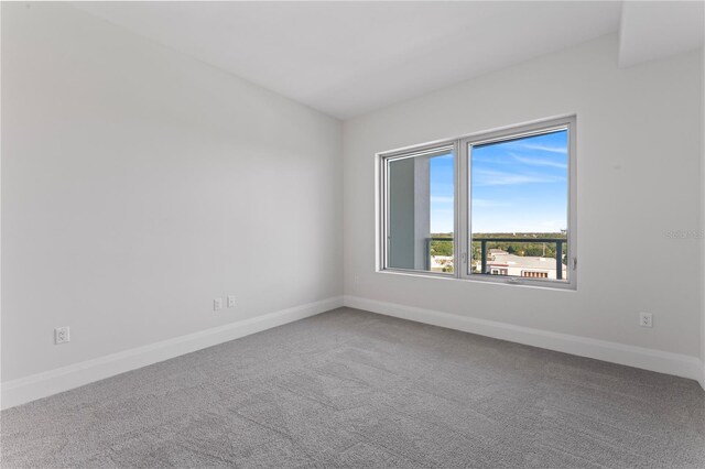 2910 W Barcelona St Unit 903, Tampa, FL 33629 - empty room featuring carpet flooring and baseboards