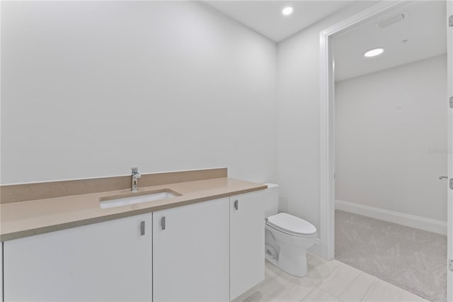 2910 W Barcelona St Unit 903, Tampa, FL 33629 - bathroom featuring toilet, vanity, and recessed lighting