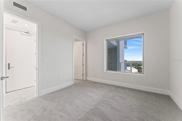 2910 W Barcelona St Unit 903, Tampa, FL 33629 - unfurnished bedroom featuring baseboards, carpet floors, and visible vents