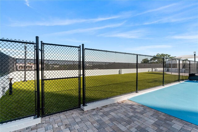 2910 W Barcelona St Unit 903, Tampa, FL 33629 - exterior space with fence, a gate, and a yard