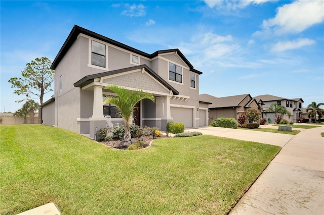 view of front facade with a front yard and a garage