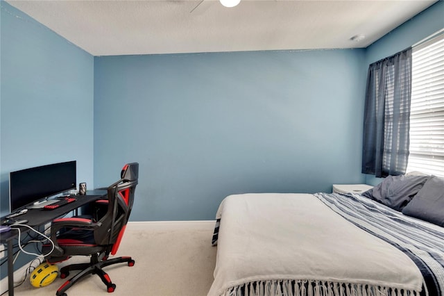 bedroom with carpet flooring and ceiling fan