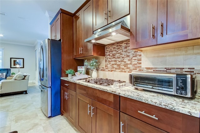 kitchen with decorative backsplash, appliances with stainless steel finishes, light stone countertops, and ornamental molding