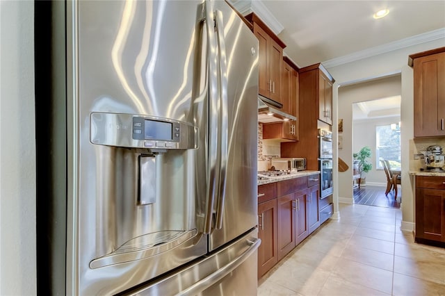 kitchen with tasteful backsplash, light stone counters, ornamental molding, stainless steel appliances, and light tile patterned floors