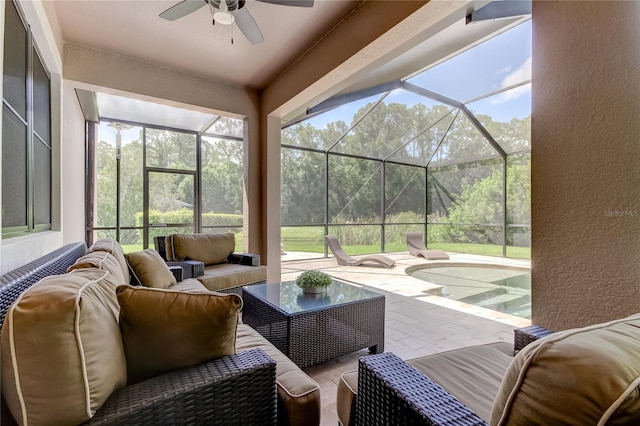 sunroom with ceiling fan