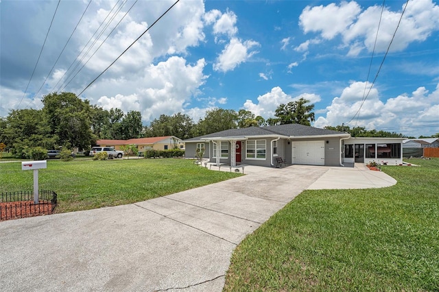 single story home with a front lawn and a garage