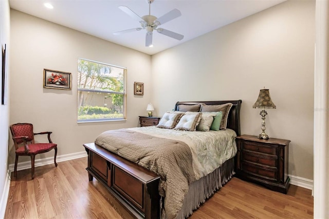 bedroom featuring ceiling fan and light hardwood / wood-style floors