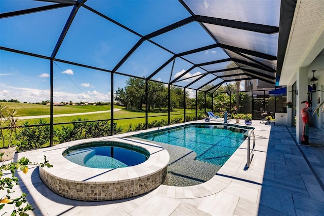 view of swimming pool featuring glass enclosure, an in ground hot tub, a patio area, and a lawn