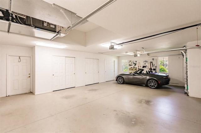 garage featuring a garage door opener