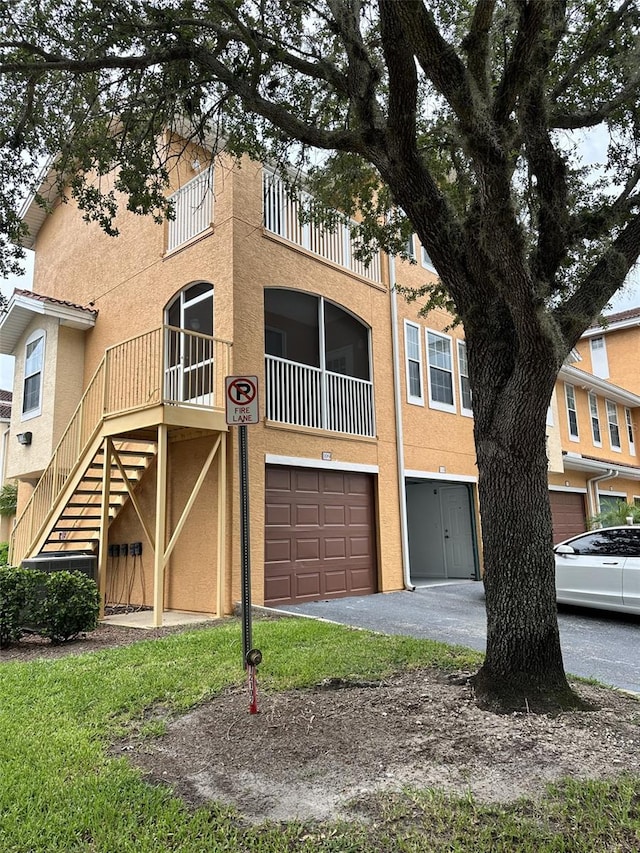 view of front of property with a garage