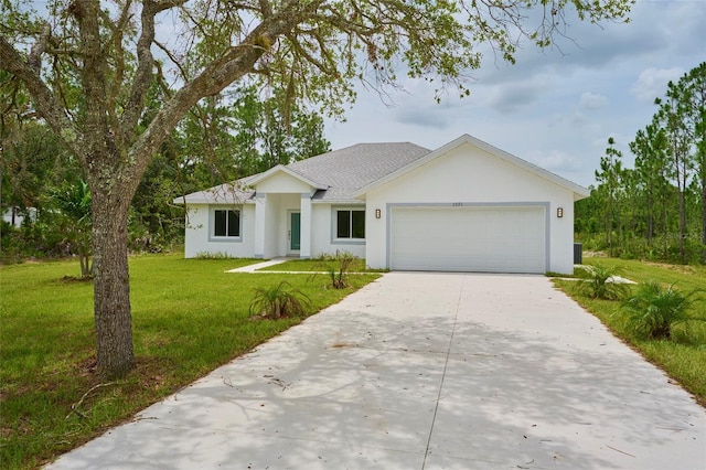 single story home with a garage and a front yard