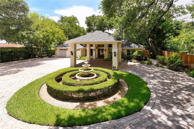 view of front of property with a garage