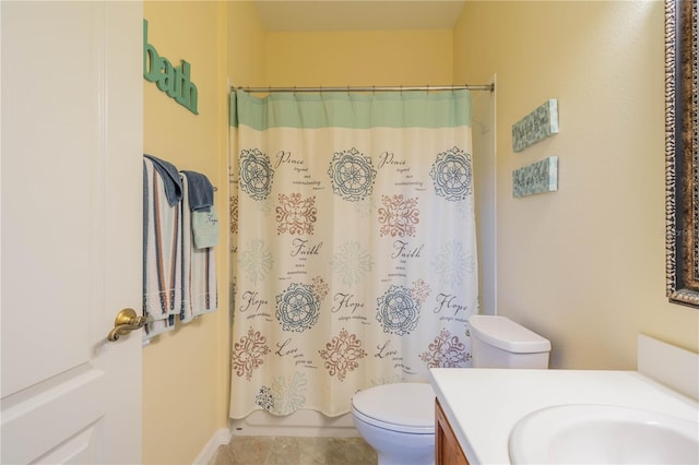 full bathroom featuring shower / bath combination with curtain, tile patterned floors, vanity, and toilet