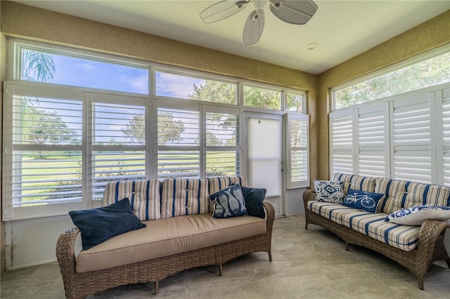 sunroom / solarium with ceiling fan