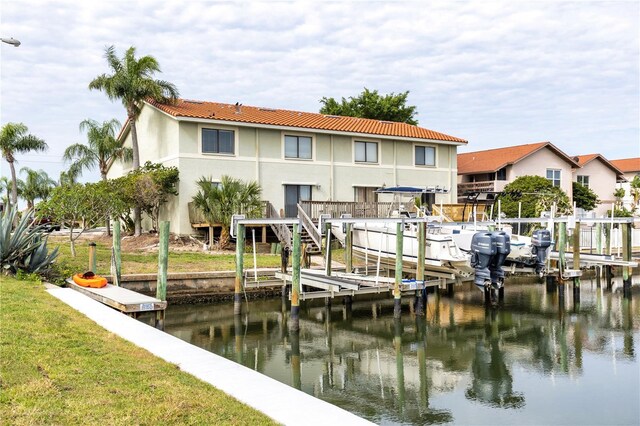 dock area with a water view