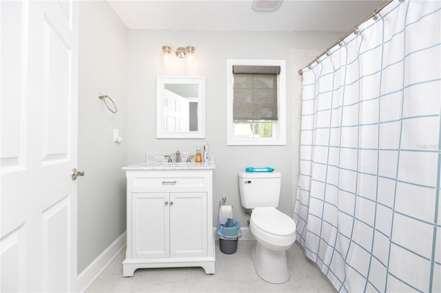 bathroom featuring tile patterned floors, vanity, toilet, and a shower with shower curtain