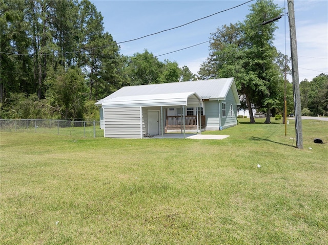 view of outbuilding featuring a lawn