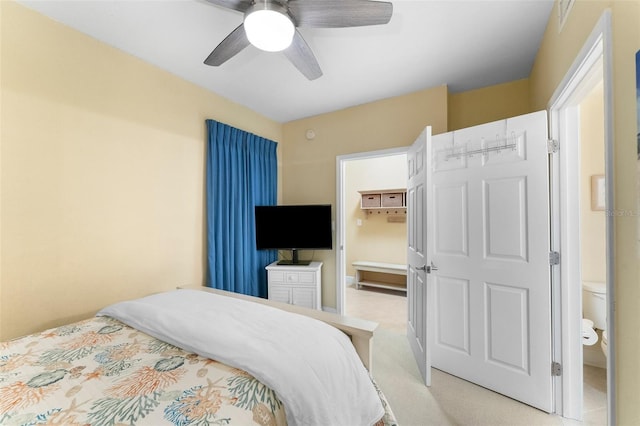 carpeted bedroom featuring ceiling fan