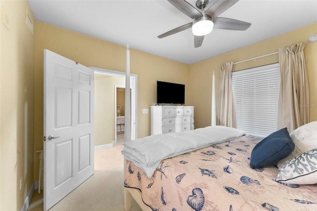 bedroom featuring ceiling fan and light colored carpet