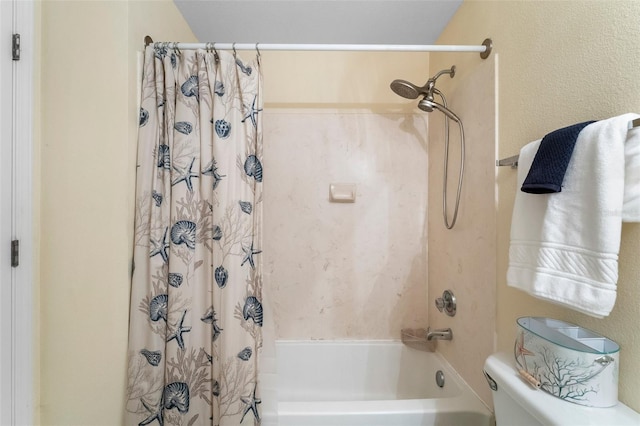 bathroom featuring shower / bath combo with shower curtain