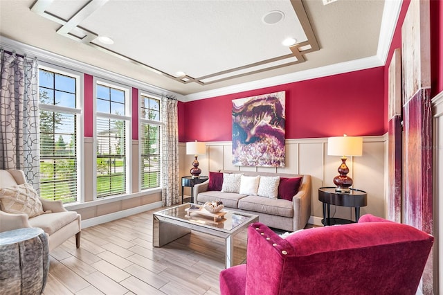 living room featuring crown molding