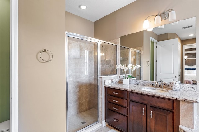 bathroom featuring vanity and walk in shower