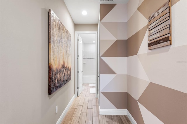 corridor featuring light hardwood / wood-style flooring