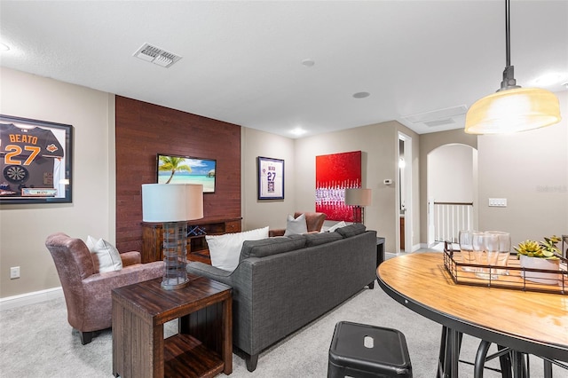 living room with light colored carpet